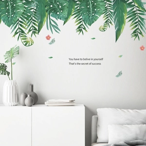Wandtattoo mit tropischen grünen Blättern Monstera Palmwedel und inspirierendem Spruch