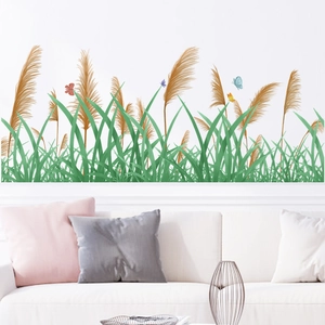 Green grass and butterfly wall stickers for living room decor with a modern sofa