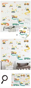 Detailed view of colorful cartoon construction vehicle wall decals in a child's bedroom