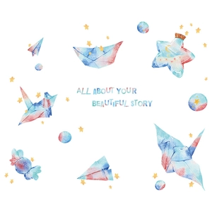 Detail of watercolor origami crane and star wall decals with dreamy pastel blue and pink tones