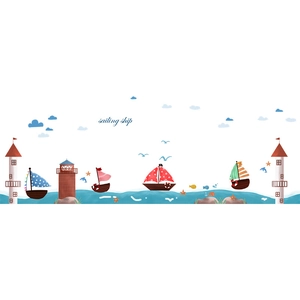 Detail of nautical wall stickers with cartoon lighthouses and sailboats for kids room