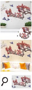 Close-up of plum blossom wall decal showing ink style birds and ancient tower detail