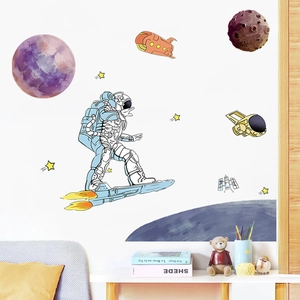 Cartoon astronaut and space planet wall stickers for a modern kids bedroom decor