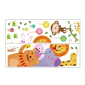Detail view of cartoon animal wall stickers featuring a lion, monkey, and giraffe