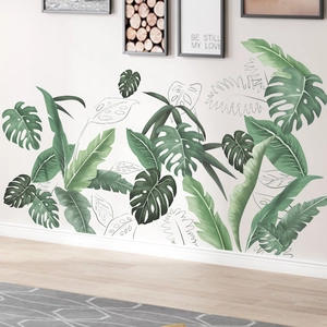 Vue détaillée des stickers muraux tropicaux aquarelle avec feuilles de monstera au salon
