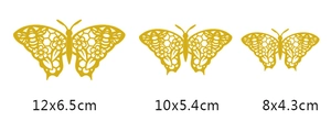 Detalle de mariposas decorativas doradas en tres tamaños para decoración de fiestas