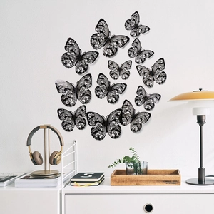 Detail von 12 schwarzen 3D-Hohl-Schmetterlings-Wandstickern mit feinen Laserschnittmustern