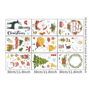 Detailed view of nine Christmas window stickers featuring Santa Claus and snowman patterns