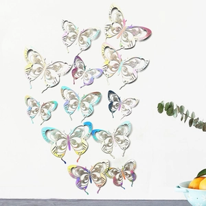 Pack of 12 3D hollow butterfly wall stickers with iridescent laser metallic texture for home