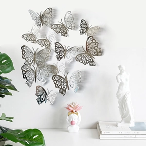 Set of 12 silver 3D hollow butterfly wall stickers for minimalist home party decor