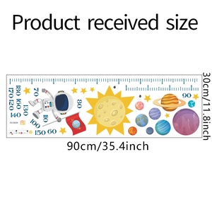 Detail of cartoon astronaut space height chart wall sticker showing planets and scale