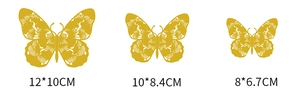 Three sizes of hollow golden butterfly wall stickers with detailed cutout patterns