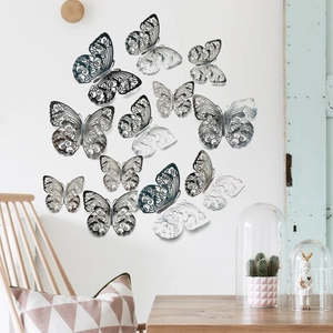 Detailansicht der 3D-Hohl-Schmetterlings-Wandaufkleber mit lasergeschnittenen Mustern auf weißer Wand