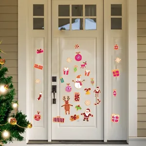 Christmas window decals set with Santa, reindeer and snowman on a white wooden door background