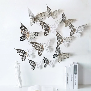 3D hollow laser-cut butterfly wall decals in champagne gold and silver for home decor
