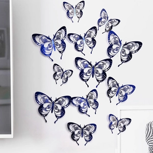 Detailed view of 3D blue hollow butterfly wall stickers with intricate cutout patterns