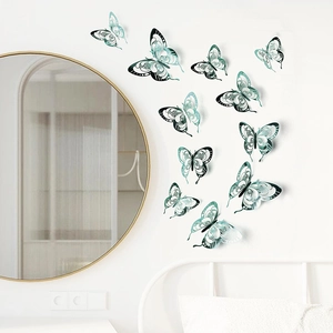 Set of 12 blue 3D hollow butterfly wall stickers with intricate laser-cut lace design