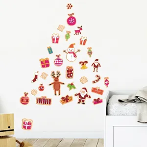 Cartoon Christmas wall stickers set with Santa and reindeer on a white bedroom wall