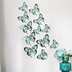 Detailed view of 3D hollow blue butterfly wall stickers with intricate laser-cut patterns