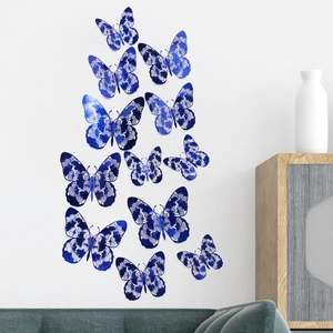 Detailed 3D blue hollowed butterfly wall stickers set on white wall home decoration
