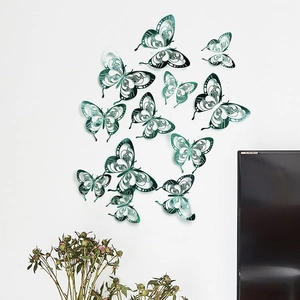 Detailed view of 3D teal hollow butterflies on wall with realistic shadow effect
