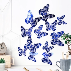 Detailed view of dark blue 3D hollow butterfly wall stickers with artistic patterns