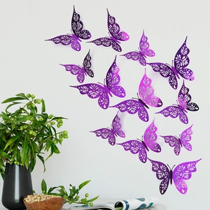 Detail of 3D purple metallic hollow butterflies on a white wall for home decor