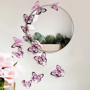 Detailed view of 3D purple hollow butterfly wall stickers on round mirror and white wall