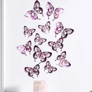 3D hollow purple butterfly wall stickers with intricate laser-cut patterns on white wall
