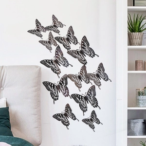 Detail of 3D hollow butterfly wall stickers in a decorative DIY home arrangement