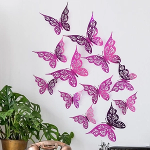 Detail of 3D purple laser-cut hollow butterfly wall stickers with metallic mirror finish