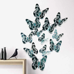 Detailed 3D hollow blue paper butterfly wall decals in a flying arrangement on white wall