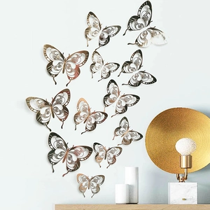 Detailed 3D hollow butterfly wall stickers in rose gold finish for home decor