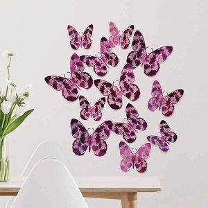 Detailed 3D hollow butterfly wall stickers with purple floral patterns on a white wall
