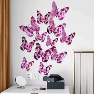 3D purple butterflies with silver hollow patterns on a white wall in a modern home