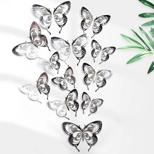3D hollow silver butterfly wall stickers with laser-cut patterns in various sizes