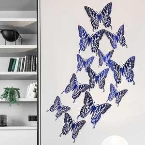 Detail of 3D blue hollow butterfly wall stickers with realistic metallic paper texture