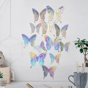 Macro detail of iridescent laser-cut hollow 3D butterfly wall stickers with metallic finish