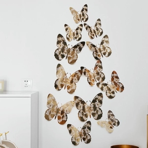 Detailed view of 12pcs gold 3D hollow butterfly wall stickers with laser cut patterns