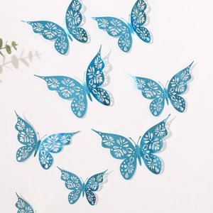 Detailed macro view of 3D hollow blue metallic butterflies for festive wall decoration