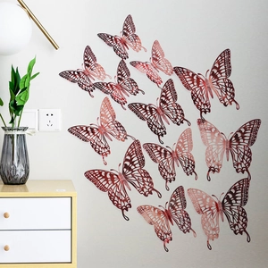 Set of 12 rose gold 3D hollow butterfly wall stickers with realistic metallic texture