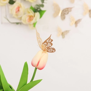 Golden hollow butterfly wall decor on tulip flower for home and party decoration