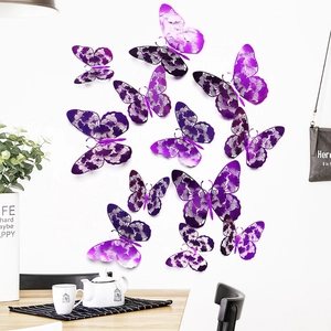 Detail showing 3D purple hollow butterflies on a white wall in a modern living space