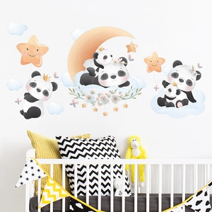 Close-up of cute panda wall stickers with moon and stars decor for nursery