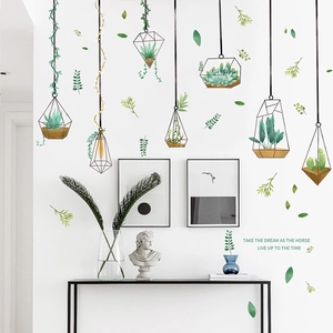 Detail view of minimalist Nordic PVC wall stickers featuring potted green plants and quote