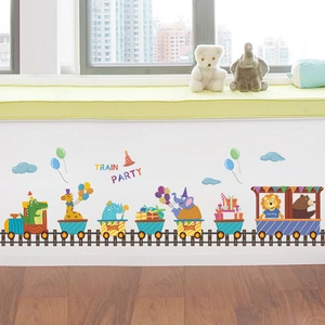 Detail of cartoon animal train wall stickers applied on white nursery room wall