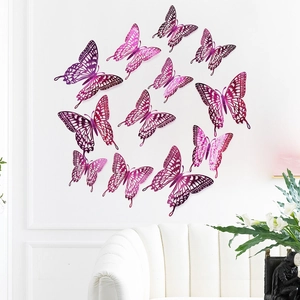 Detailed macro of 3D cutout butterfly wall stickers with pink and purple metallic finish