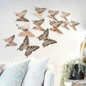 Detailed 3D hollow butterfly wall stickers in rose gold metallic finish for home decor