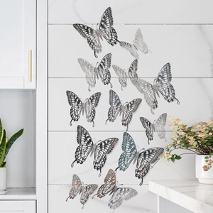 Detailed silver 3D hollow butterfly wall stickers on marble background with folding wings
