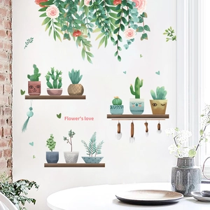 Dettaglio di adesivi murali con piante succulente verdi e fiori per decorazione casa